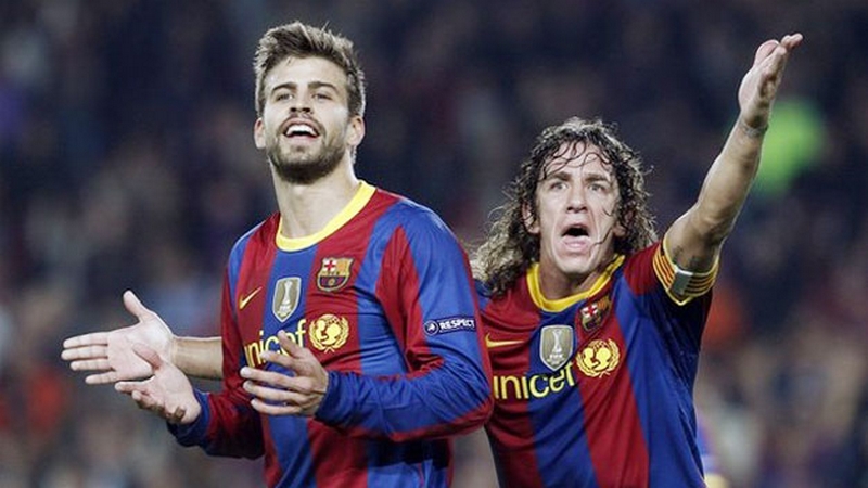 Cặp trung vệ Carles Puyol và Gerard Pique đã tạo nên sự chắc chắn Cặp trung vệ Carles Puyol và Gerard Pique đã tạo nên sự chắc chắn